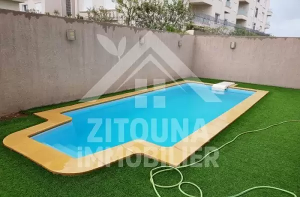 A louer un appartement dans une résidence gardée aux les jardins de carthage