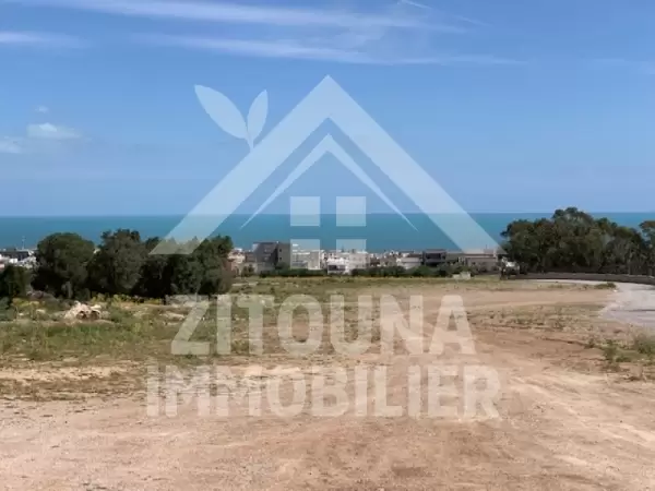 A vendre un terrain de 1300 m2 ayant une superbe vue la montagne de bougarnin et vue sur mer